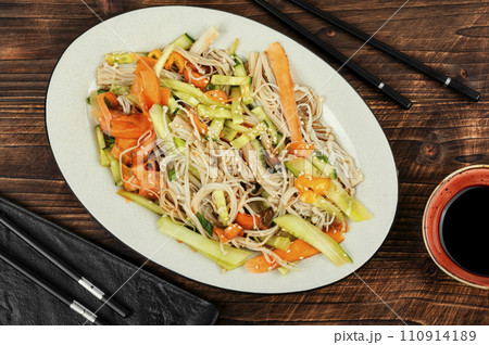 Enoki mushroom spicy salad. Enoki mushroom spicy salad. 110914189