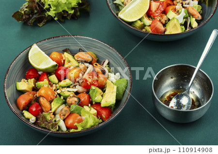 Homemade seafood salad with fish mussels, octopus. Homemade seafood salad with fish mussels, octopus. 110914908