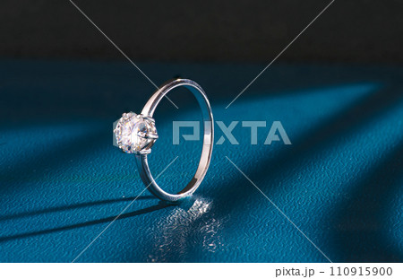 women's ring with diamonds on dark background. Contains clipping paths women's ring with diamonds on dark background. Contains clipping paths 110915900