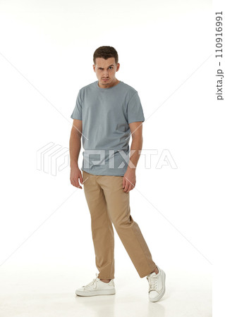 offended frustrated young man on white background. sadness 110916991