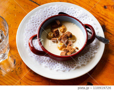 Custard dessert with cream cheese, brownie, praline 110919726