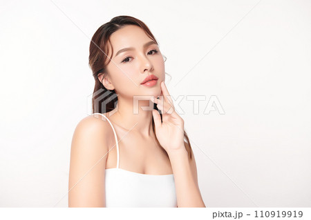 Beautiful young asian woman with clean fresh skin on white background, Face care, Facial treatment, Cosmetology, beauty and spa, Asian women portrait. Beautiful young asian woman with clean fresh skin on white background, Face care, Facial treatment, Cosmetology, beauty and spa, Asian women portrait. 110919919
