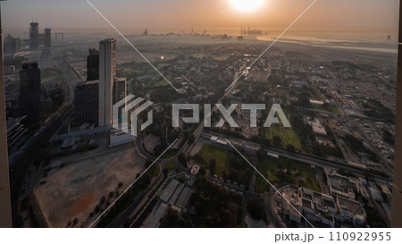 Villas in Zabeel district with skyscrapers on a background aerial night to day timelapse in Dubai, UAE 110922955