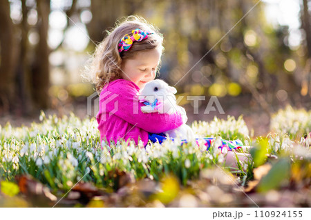 Child with rabbit. Easter bunny. Kids and pets. Child with rabbit. Easter bunny. Kids and pets. 110924155