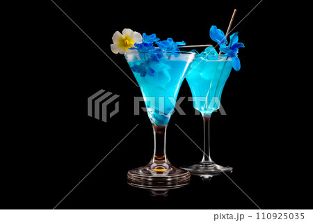 Set of Blue Curacao cocktails garnished with a lime isolated on black background 110925035