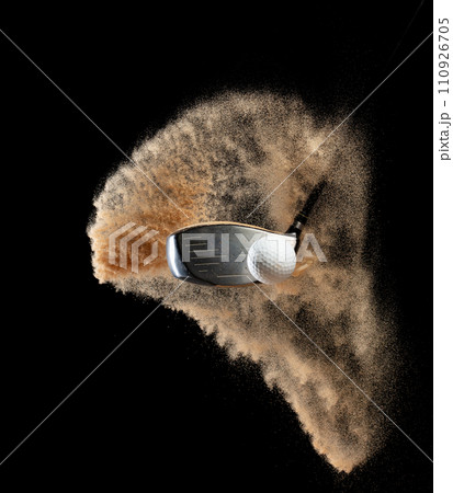 Golf ball tee explode from sand bunker. Golfer hit ball with club to sand explosion to green. Golf club hit ball tee in sand bunker explosion. Black background isolated freeze motion Golf ball tee explode from sand bunker. Golfer hit ball with club to sand explosion to green. Golf club hit ball tee in sand bunker explosion. Black background isolated freeze motion 110926705