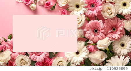 White and pink gerberas on a pink background with space for text 110926899