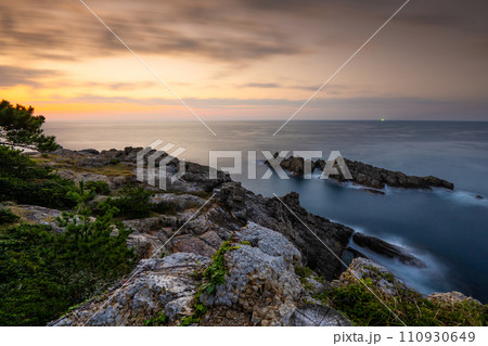 Coastal rocks at sunset seascape Coastal rocks at sunset seascape 110930649