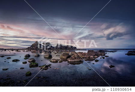 Coastal rocks at sunset seascape Coastal rocks at sunset seascape 110930654