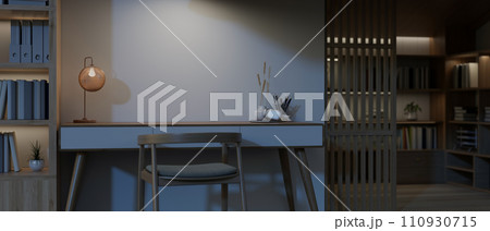 Modern, luxury home office at night with a table, an armchair, a bookshelf, and a home library Modern, luxury home office at night with a table, an armchair, a bookshelf, and a home library 110930715
