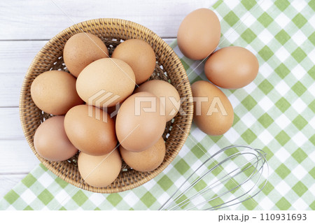 Organic chicken eggs and egg whisk Organic chicken eggs. Organic chicken eggs and egg whisk Organic chicken eggs. 110931693