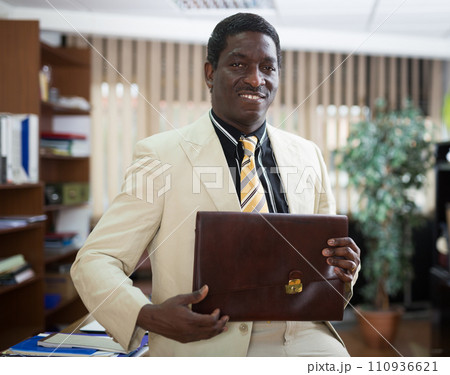 Portrait of successful and confident male businessman in office Portrait of successful and confident male businessman in office 110936621