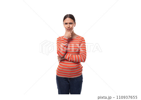 young smart caucasian woman with black hair is dressed in a striped orange jacket on a white 110937655
