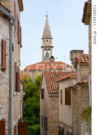 view of narrow street in old district of Budva, Montenegro 110938851