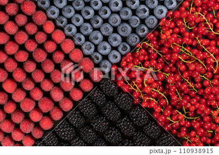 Fresh raspberries, blackberries, redcurrant and blueberries in one layer Fresh raspberries, blackberries, redcurrant and blueberries in one layer 110938915