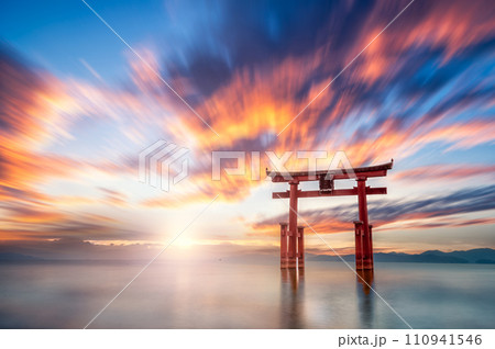 Torii Gate in a lake at sunset / sunrise Shirahige shrine Shiga Torii Gate in a lake at sunset / sunrise Shirahige shrine Shiga 110941546