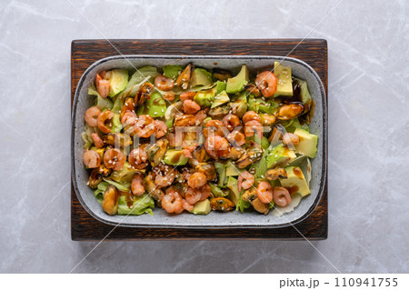 Overhead view of salad with shrimp, mussels and avocado Overhead view of salad with shrimp, mussels and avocado 110941755