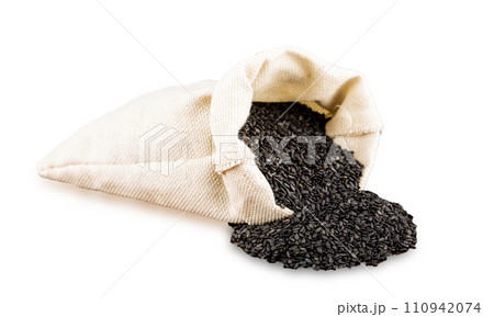 Back sesame in burlap isolated on white background 110942074
