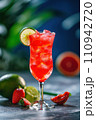 red cocktail with raspberries and mint 110942720