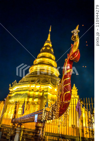 Wat Phra That Haripunchai Woramahawihan during Loy Krathong festival, in Lapmhun, Thailand Wat Phra That Haripunchai Woramahawihan during Loy Krathong festival, in Lapmhun, Thailand 110944279