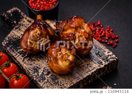 Delicious grilled chicken legs with spices and herbs in teriyaki sauce 110945118