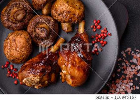 Delicious grilled chicken legs with spices and herbs in teriyaki sauce 110945167