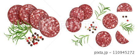 Smoked sausage salami slices isolated on white background with full depth of field. Top view. Flat lay Smoked sausage salami slices isolated on white background with full depth of field. Top view. Flat lay 110945272