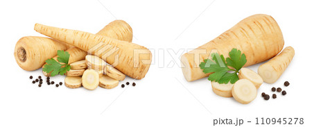 Parsnip root and slices with parsley peppercorns isolated on white background closeup Parsnip root and slices with parsley peppercorns isolated on white background closeup 110945278
