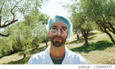 Agronomy in olive field. Close up. Agronomy in olive field. Close up. 110948477