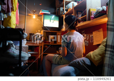Watching broadcast on screen of TV set Watching broadcast on screen of TV set 110949261