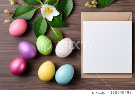 Fresh Spring flowers with Easter Eggs on Wood 110949498