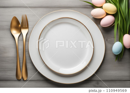 Elegant Easter Table Setting with Flowers and Eggs Elegant Easter Table Setting with Flowers and Eggs 110949569