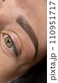 Close up view of beautiful brown female eye. Perfect trendy eyebrow. Good vision, contact lenses, brow bar or fashion eyebrow makeup concept 110951717