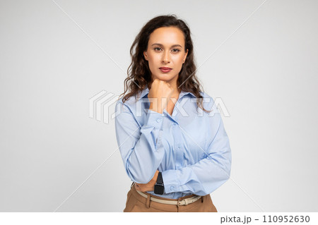 Pensive serious young european businesswoman, teacher in formal wear think Pensive serious young european businesswoman, teacher in formal wear think 110952630