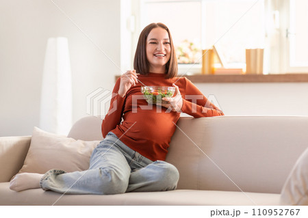 Happy Pregnant Woman Posing With Fresh Vegetable Salad Eating Indoor 110952767