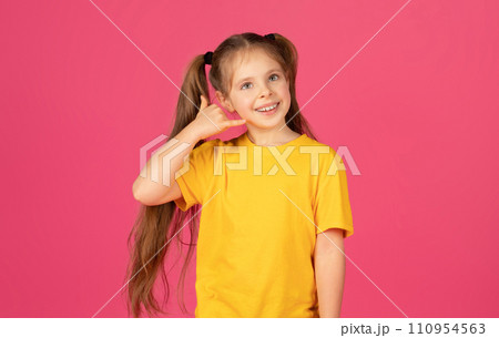 Make Call. Preteen Little Girl With Hand Near Ear Imitating Phone 110954563