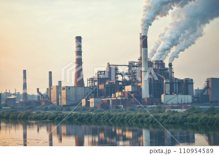 A factory with multiple smokestacks emitting pollution into the air. 110954589