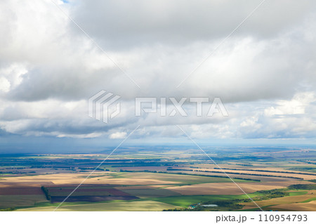 Landscape photo with cloudy sky over Belokurikha, Altai Krai 110954793