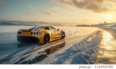 Sports car drifts on ice on a frozen lake 110956496