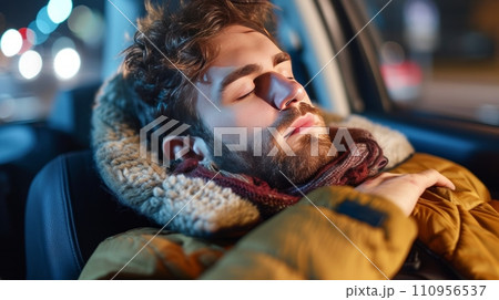 young man fell asleep at the wheel of a car young man fell asleep at the wheel of a car 110956537