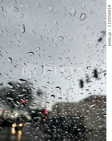 rain drops on car windshield rain drops on car windshield 110956659