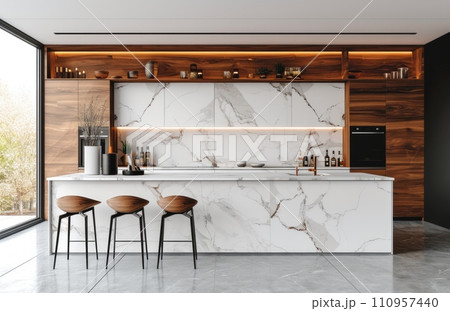 a white kitchen with wooden accent wall 110957440
