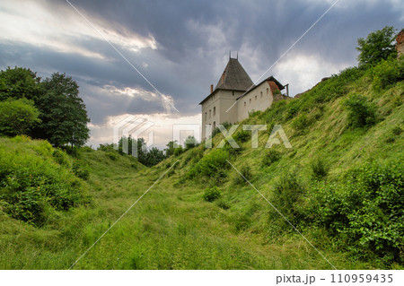 Medieval Halych Castle under stormy sky in Ukraine. Medieval Halych Castle under stormy sky in Ukraine. 110959435
