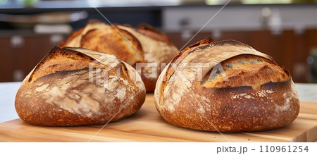 Delicious homemade sourdough bread food photography recipe idea with rustic artisan loaf Delicious homemade sourdough bread food photography recipe idea with rustic artisan loaf 110961254