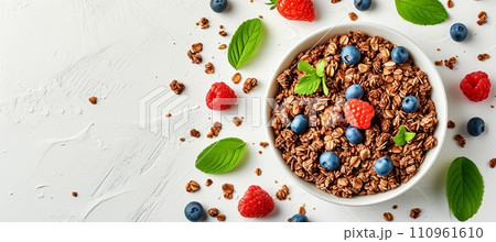 Healthy oatmeal porridge with berries on white table   top view, diet breakfast with copy space 110961610