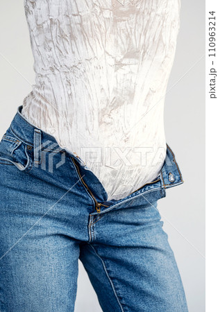 Woman with jeans. Anonymus lady dressing up. 110963214