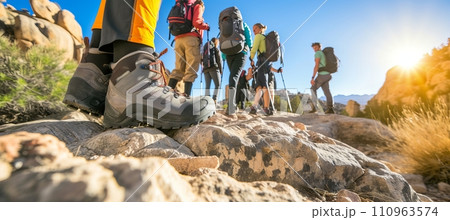 Hiker s shoes on mountain trail amidst scenic nature and people enjoying hiking experience. Hiker s shoes on mountain trail amidst scenic nature and people enjoying hiking experience. 110963574
