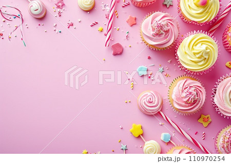 AI-generated content. Pink table top on pink background with decorated lollipops and cupcakes, children birthday party 110970254