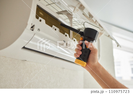 Dirty air conditioner filter need cleaning. Air conditioner service, repair and clean equipment. Dirty air conditioner filter need cleaning. Air conditioner service, repair and clean equipment. 110975723