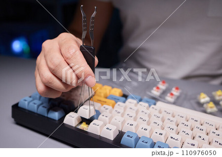 top view of keys and buttons circuit board of disassembled accounting calculator close up 110976050